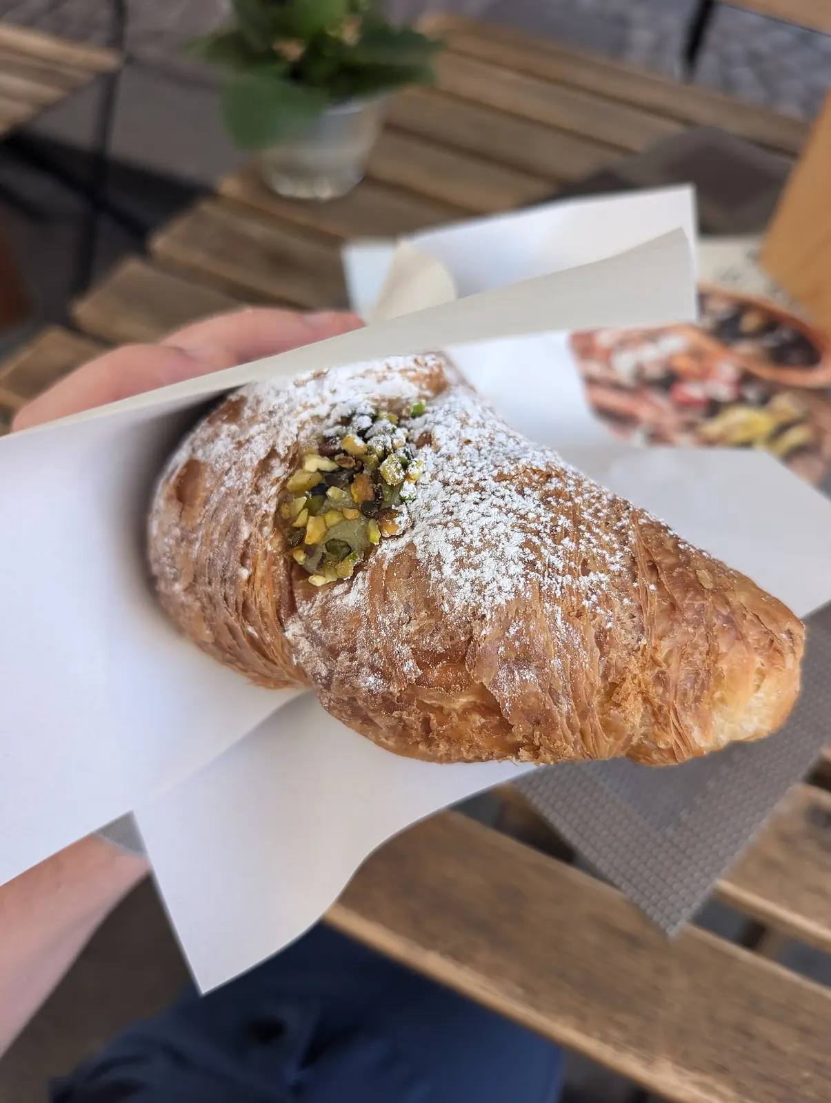Pistachio croissant on a plate